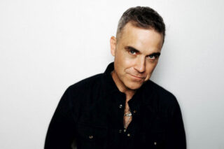 Robbie Williams celebra i suoi 25 anni di carriera da solista con “XXV” il nuovo album